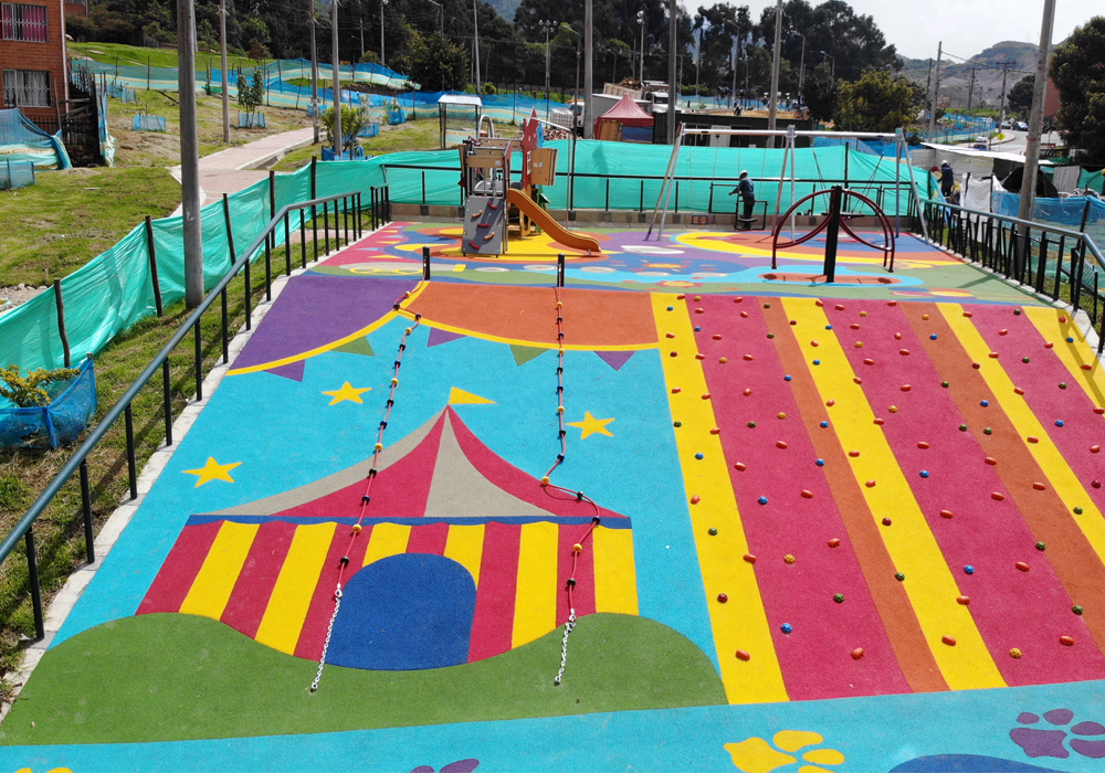 Parque-infantil-nuevo-milenio-bogota-juegos-infantiles-piso-caucho
