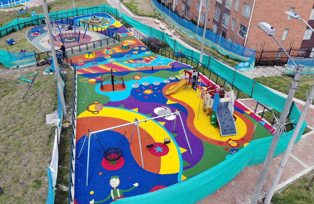 Parque-infantil-nuevo-milenio-bogota-juegos-infantiles-piso-caucho-EPDM